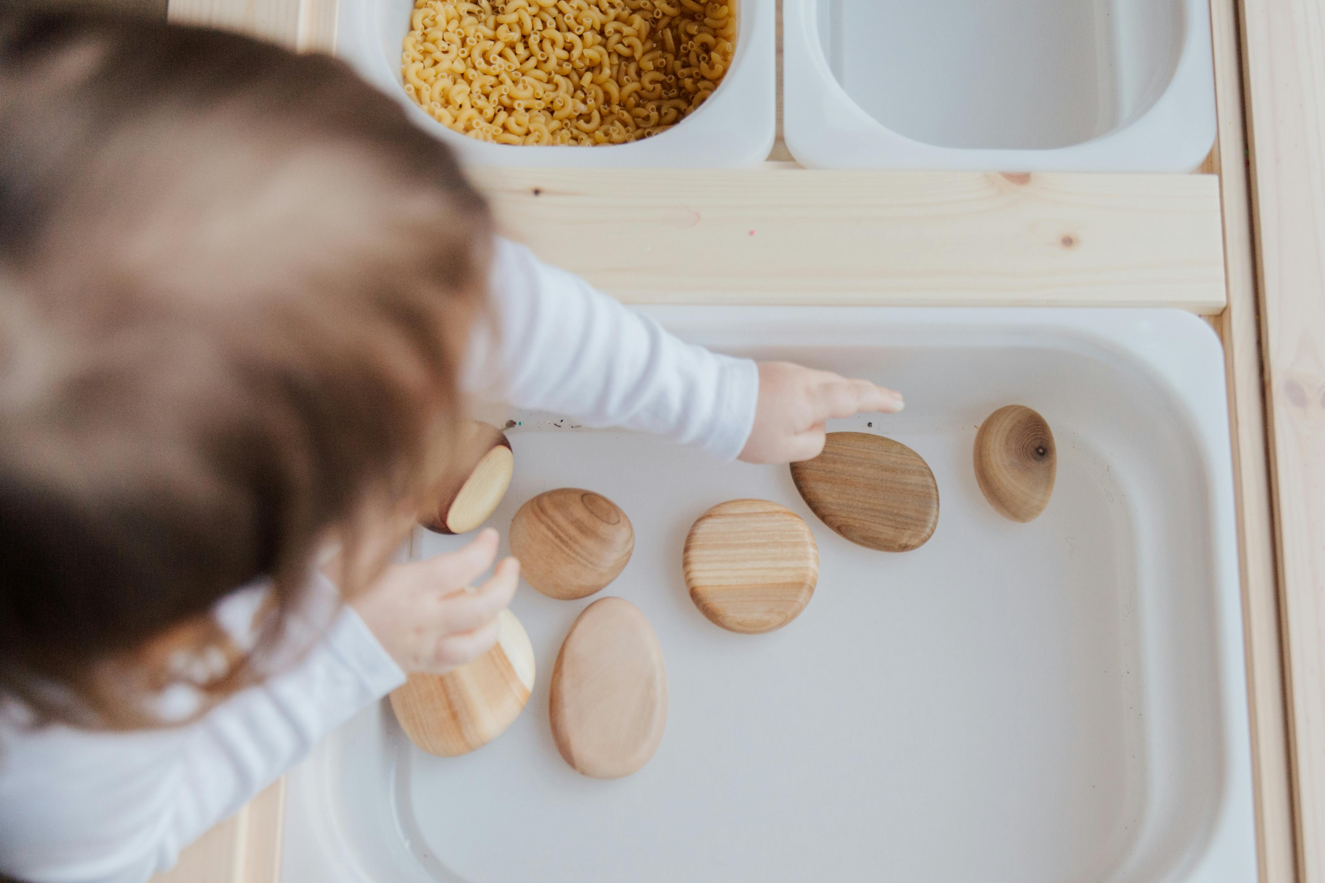 Child with wodden blocks